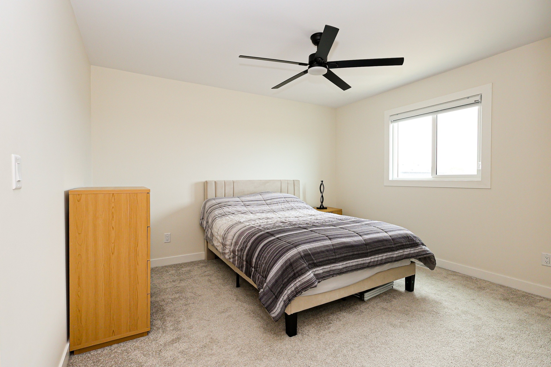 1615 Richardson Road #175 — bedroom with ceiling fan and window