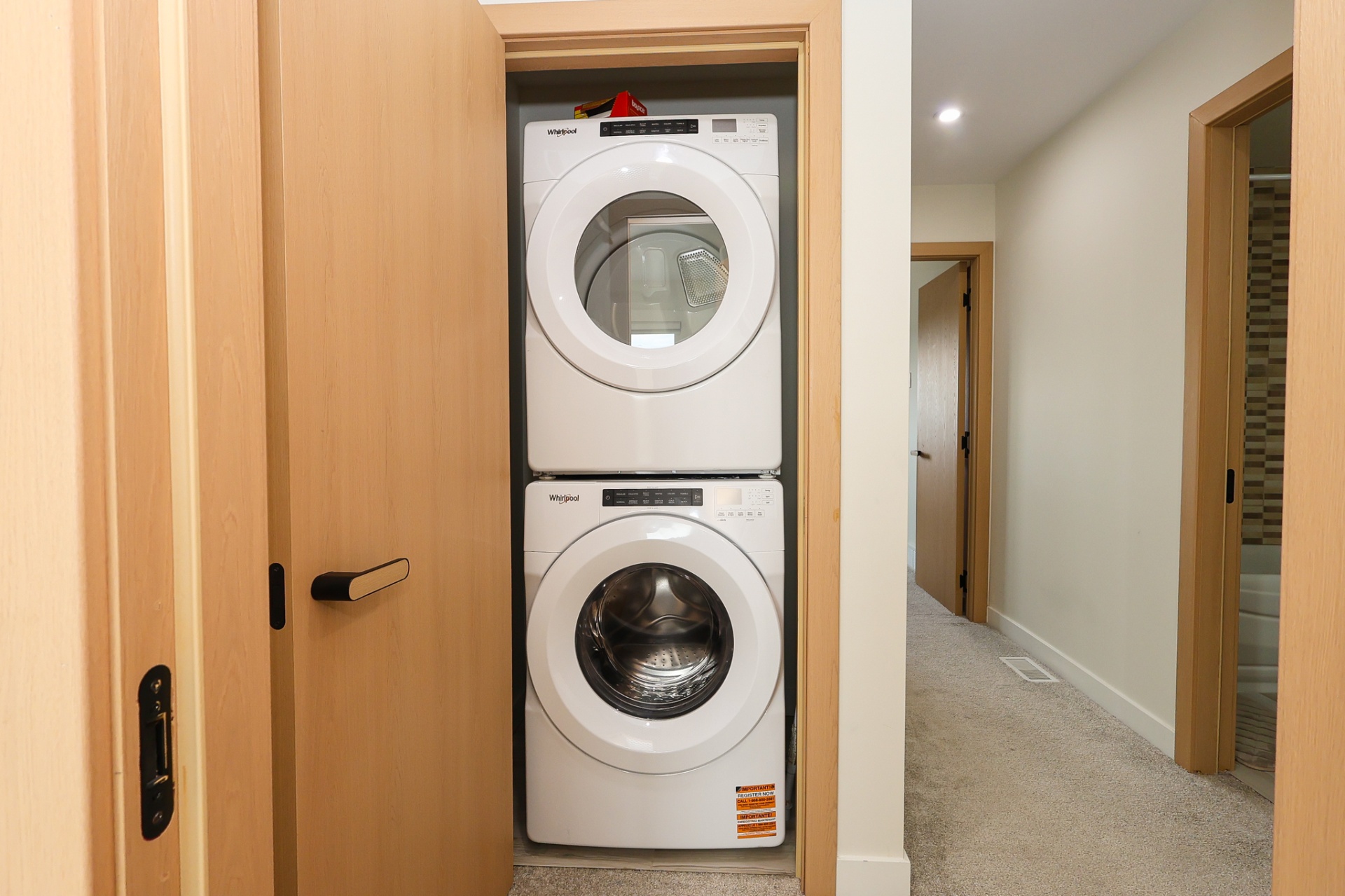 1615 Richardson Road #175 — stacked washer and dryer in hallway closet